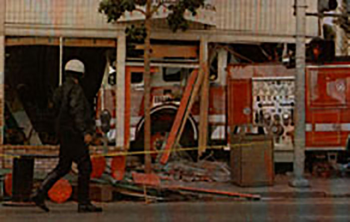 A fire truck embedded in the building that housed Radio Valencia